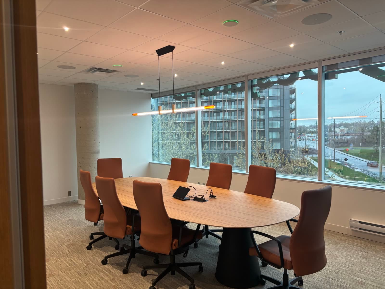 Boardroom fit-up with linear pendant and recessed lighting