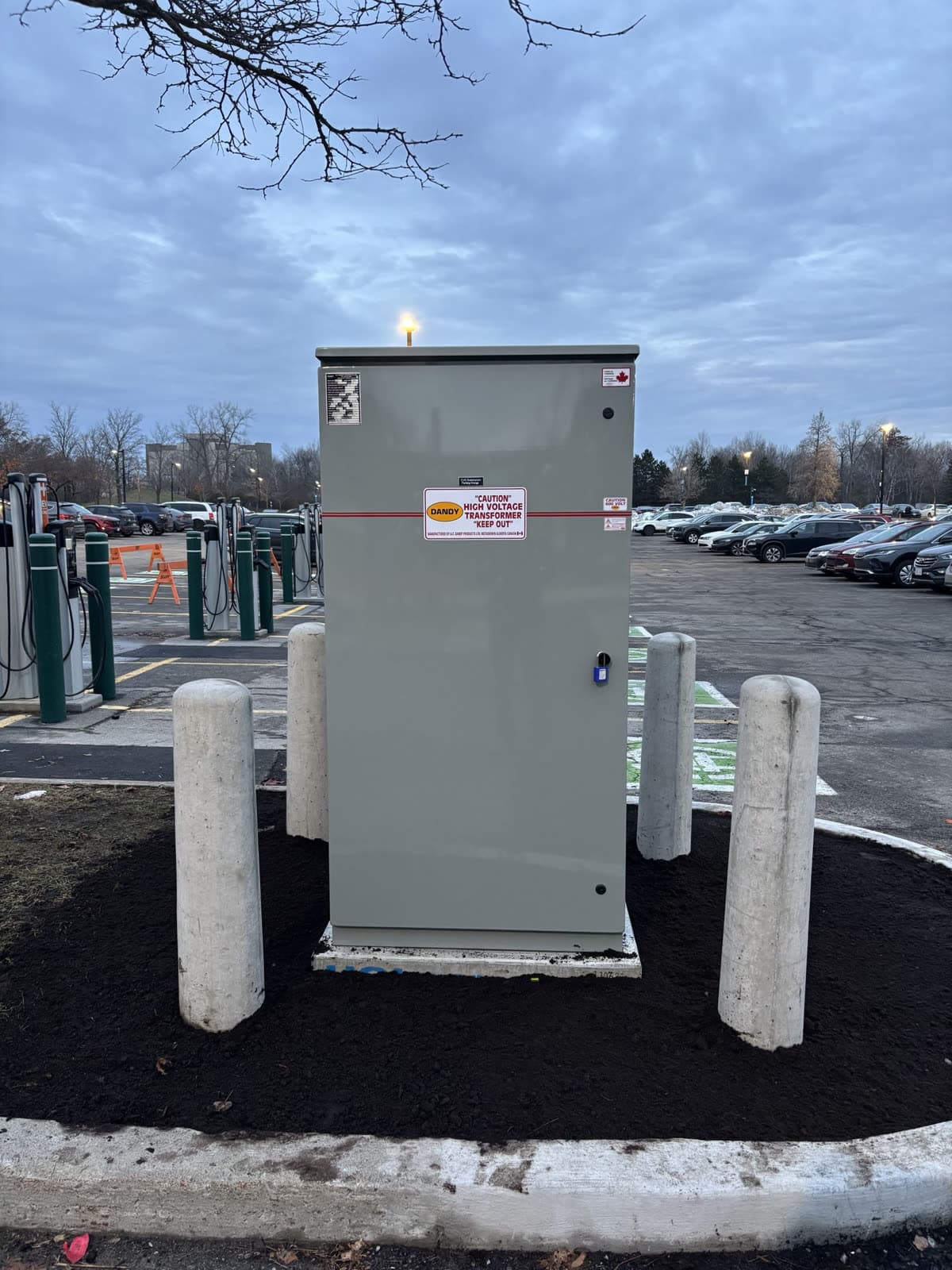 Pad-mounted transformer serving the EV charging bays